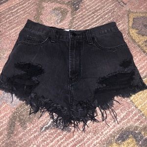 Black distressed shorts